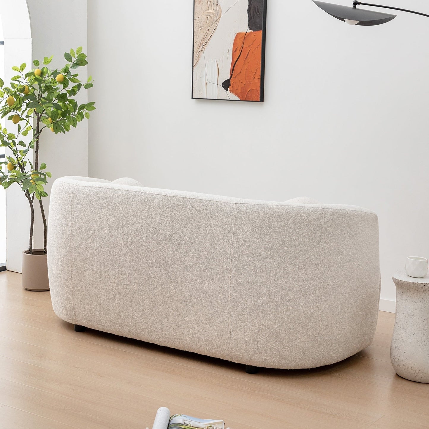 Canapé 2 places KINWELL en tissu bouclé avec coussins