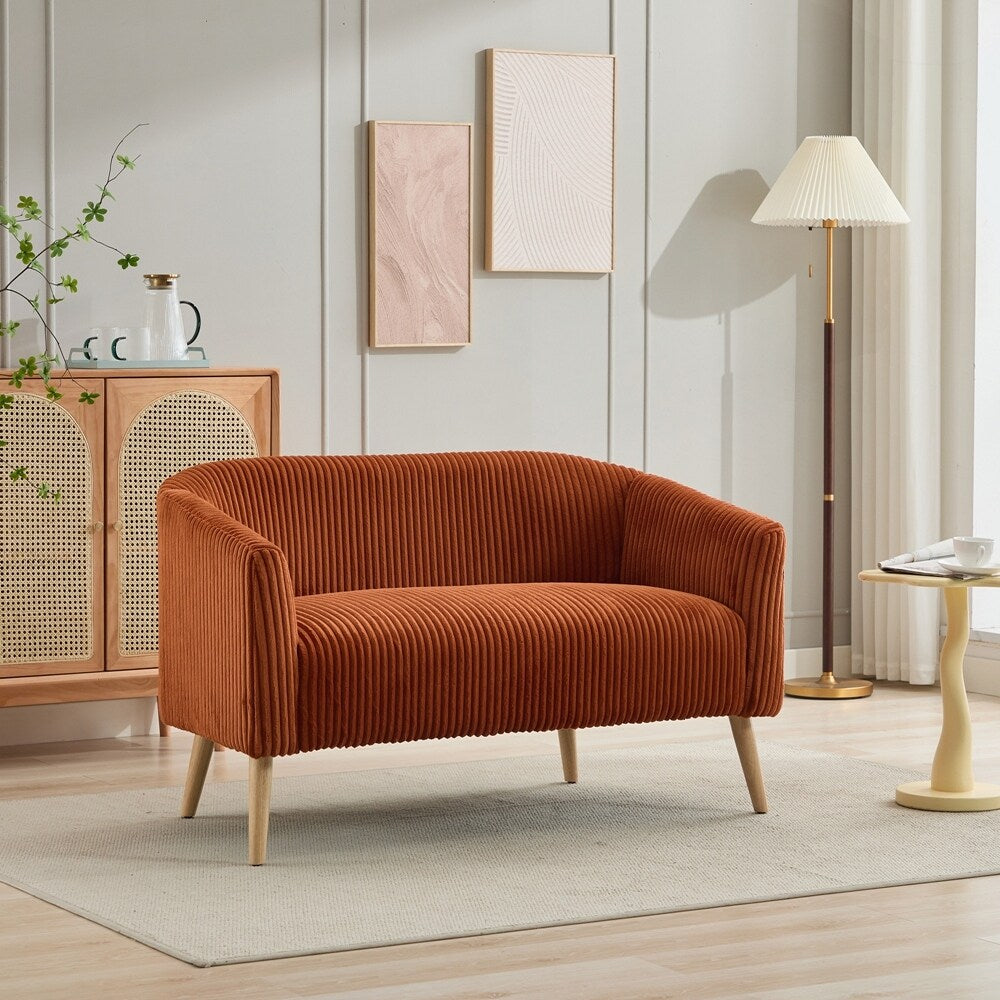 Canapé 2 places recouvert de tissu velours côtelé avec pieds en noyer