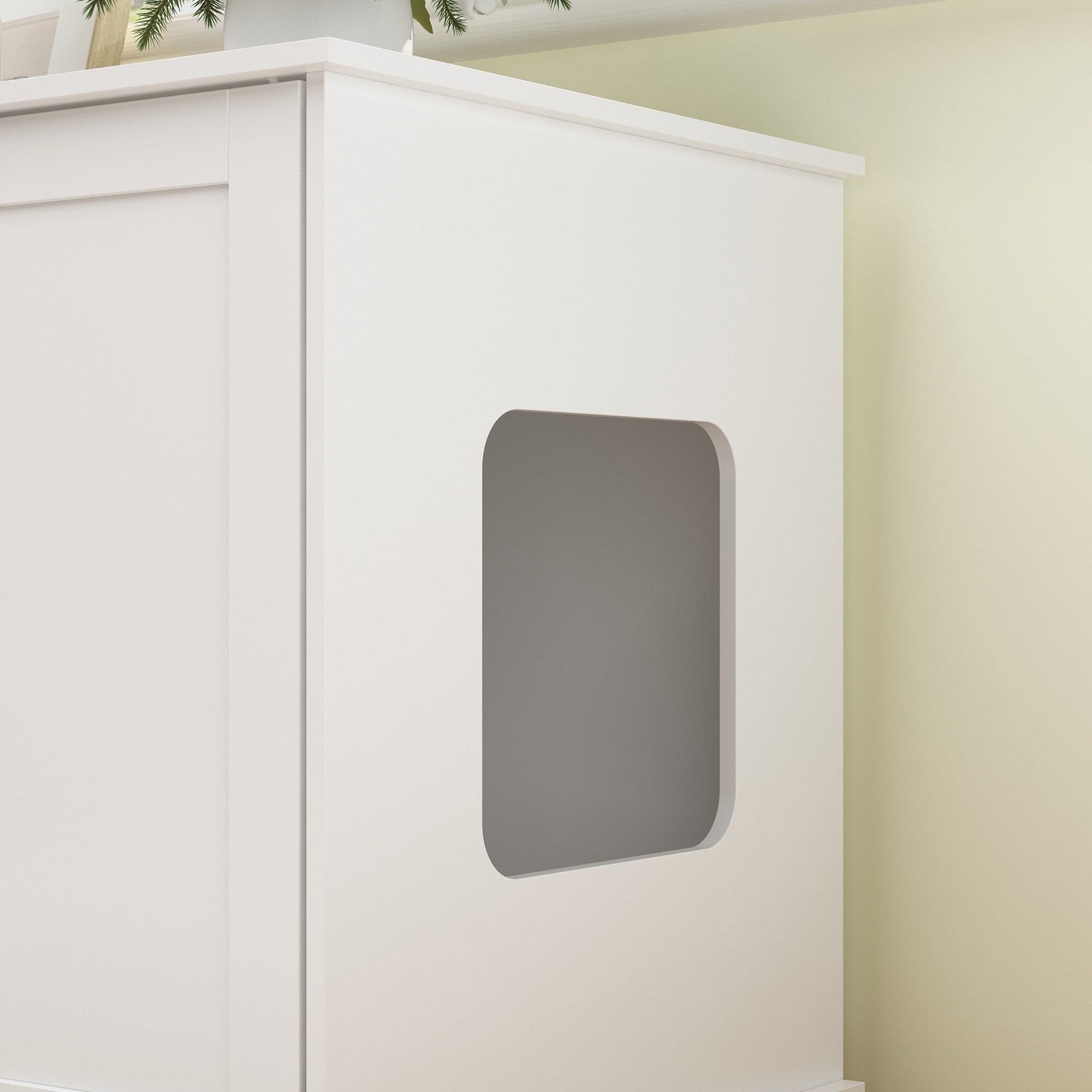 Meubles dissimulant la litière pour chat dans une salle de bain privée pour animaux de compagnie