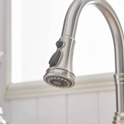 Robinet de cuisine moderne monotrou avec douchette extractible et plaque de montage.