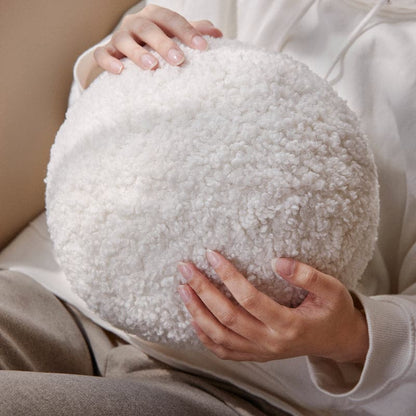 Coussin en forme de boule de sésame