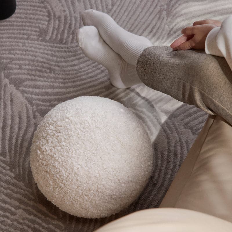 Coussin en forme de boule de sésame